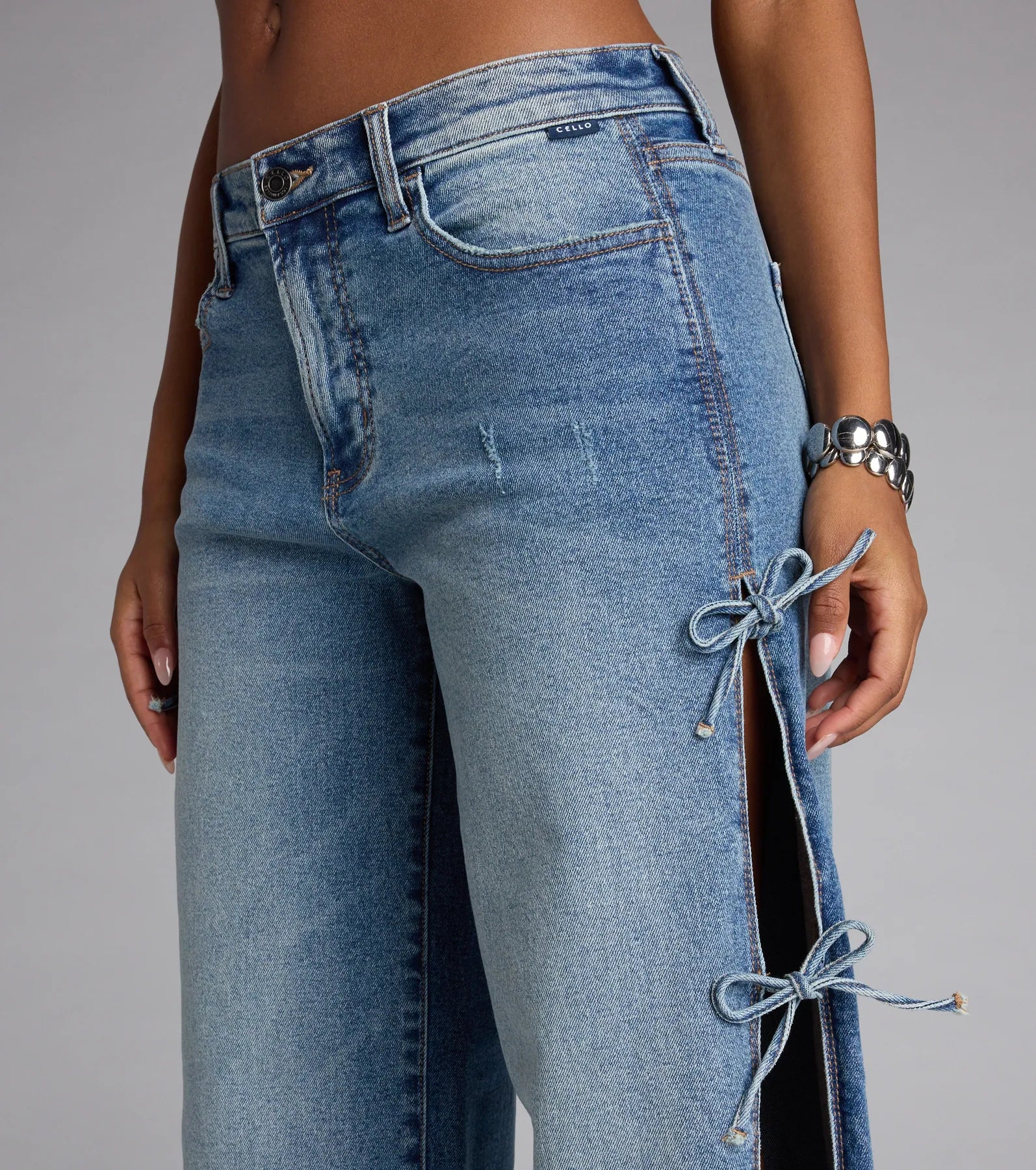 Tied Up in Denim Bow Mid-Rise Denim Jeans